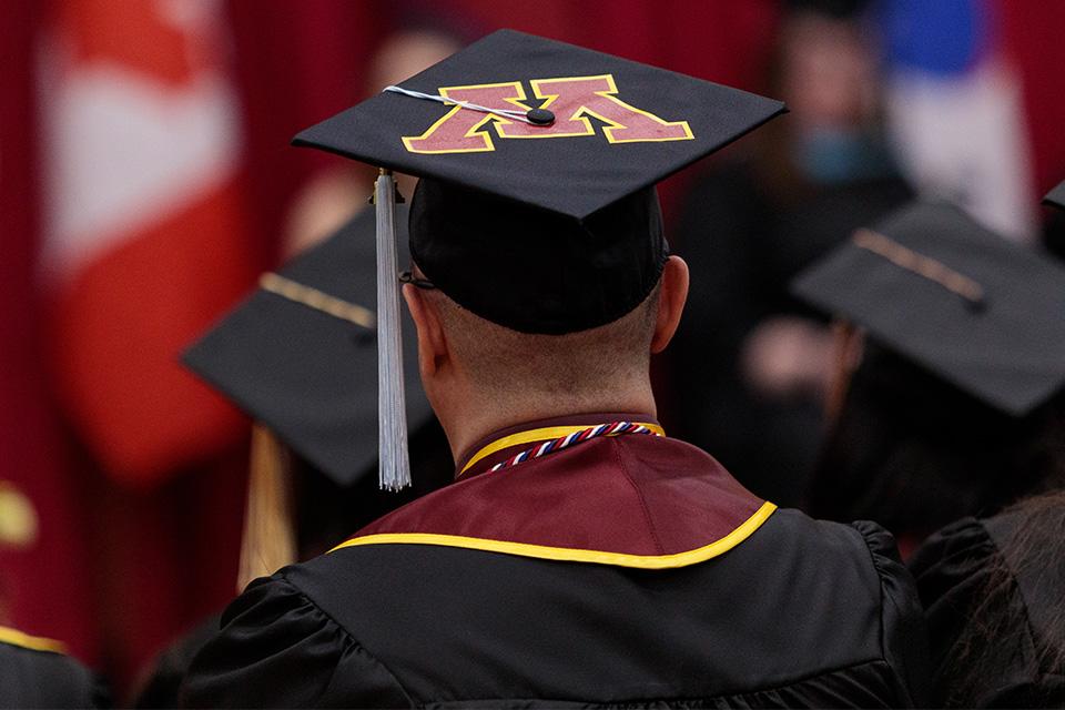Commencement "M" logo hat during the ceremony