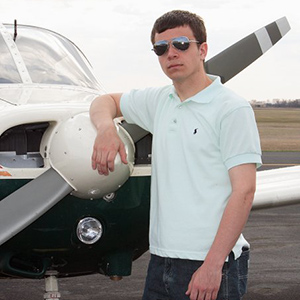 Karl Syverson, 2011 aviation program graduate, first day of flight school photo.