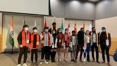 Photo of International Students with their Sashes