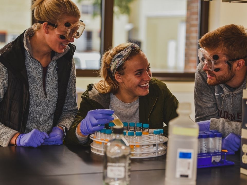 Three students in the Collaboration Lab