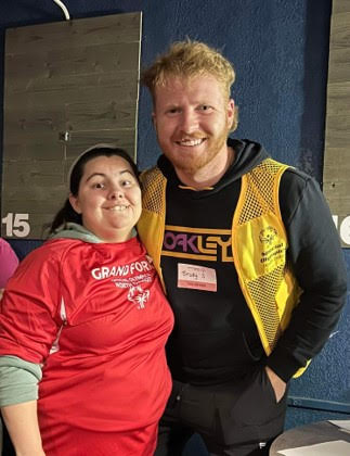 U of M Crookston exercise science and wellness student Brody Sorenson is pictured with a Special Olympics athlete