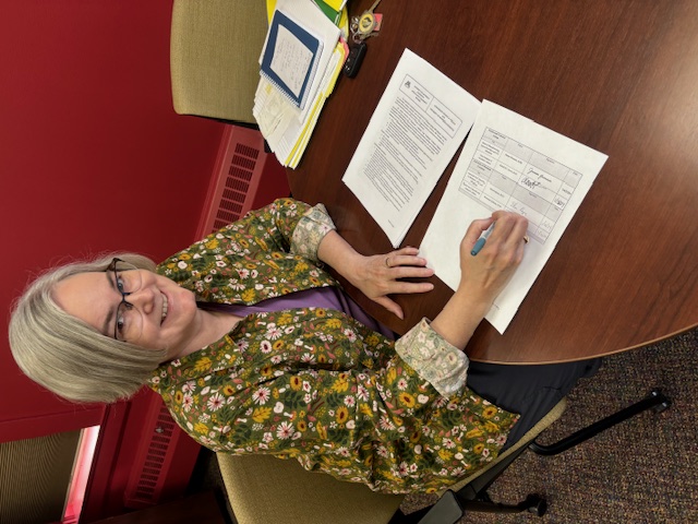 Senior Vice Chancellor Rosemary Johnsen signs the agreement with Northwood Technical College of Wisconsin