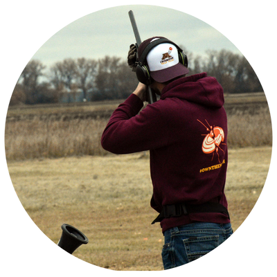 Golden Eagle male student shooting trap at the Crookston Gun Club