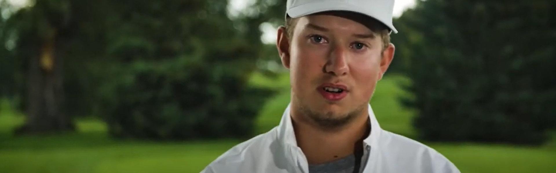 Matt Moroz on the golf course giving an interview