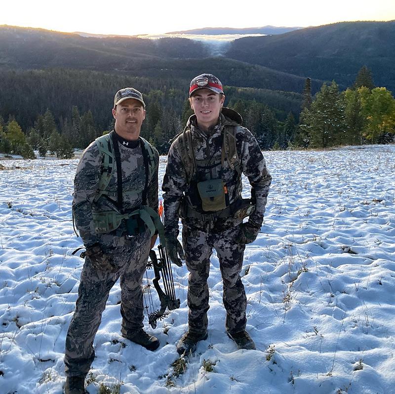 Mark Olsonawski and his son bow hunting during the winter