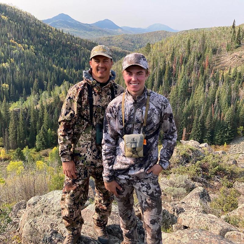 Mark Olsonawski and his son hunting during the fall in the mountains