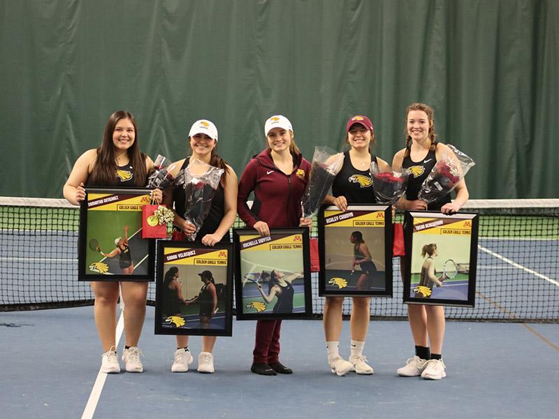 Golden Eagle tennis seniors with their senior gifts at Choice Health and Fitness in Grand Forks ND