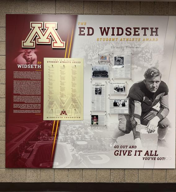 Ed Widseth Display in the Sports Center across from Lysaker Gymnasium features the Ed Widseth Student Athlete Award. On it is a plaque with a list of student award recipients as well as old newspaper clippings about Ed Widseth and the first ever Ed Widseth Award recipient, Mark Olsonawski. 