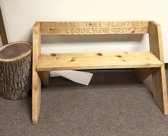 Wooden tree bench on 2nd floor of Owen Hall