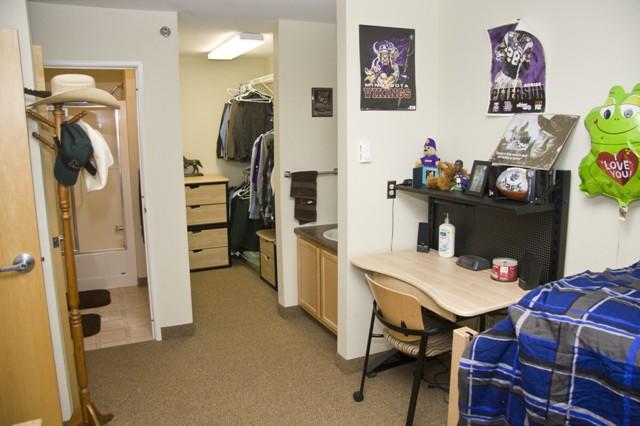 Centennial Hall male bedroom 1 with external sink, bathroom and walk in closets
