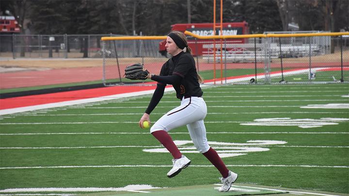 Katie Humhej pitching a softball