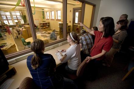 Education students and faculty use the observation room