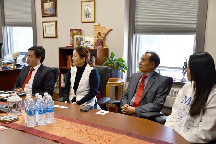 BKC President Hoang Van Phuc, Professor Tran Huu Yen Loan, President of Study Abroad Promotion Council Mr. Park Sang Soon, and student Yeongee Park on the UMN Crookston campus