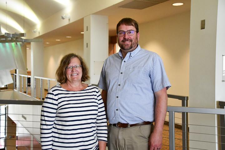Brenda Boyzk retired after 12 years; she's pictured with Facilities Director Ryan Moe