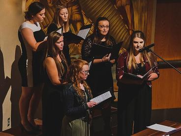 UMC Choir Singing in Kiehle Auditorium