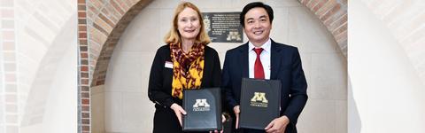 UMC Chancellor Mary Holz-Clause and BKC President Hoang Van Phuc