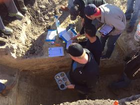 Students taking soil samples