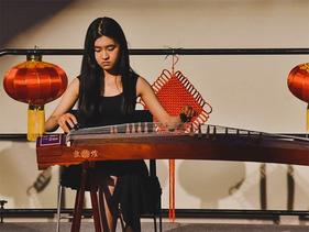 International student playing a musical instrument