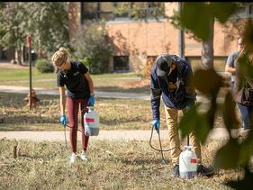 Students spot spraying in the U of M Crookston Nature Nook